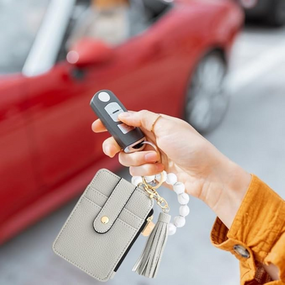 Pequeno porta-cartões e porta-chaves para mulher